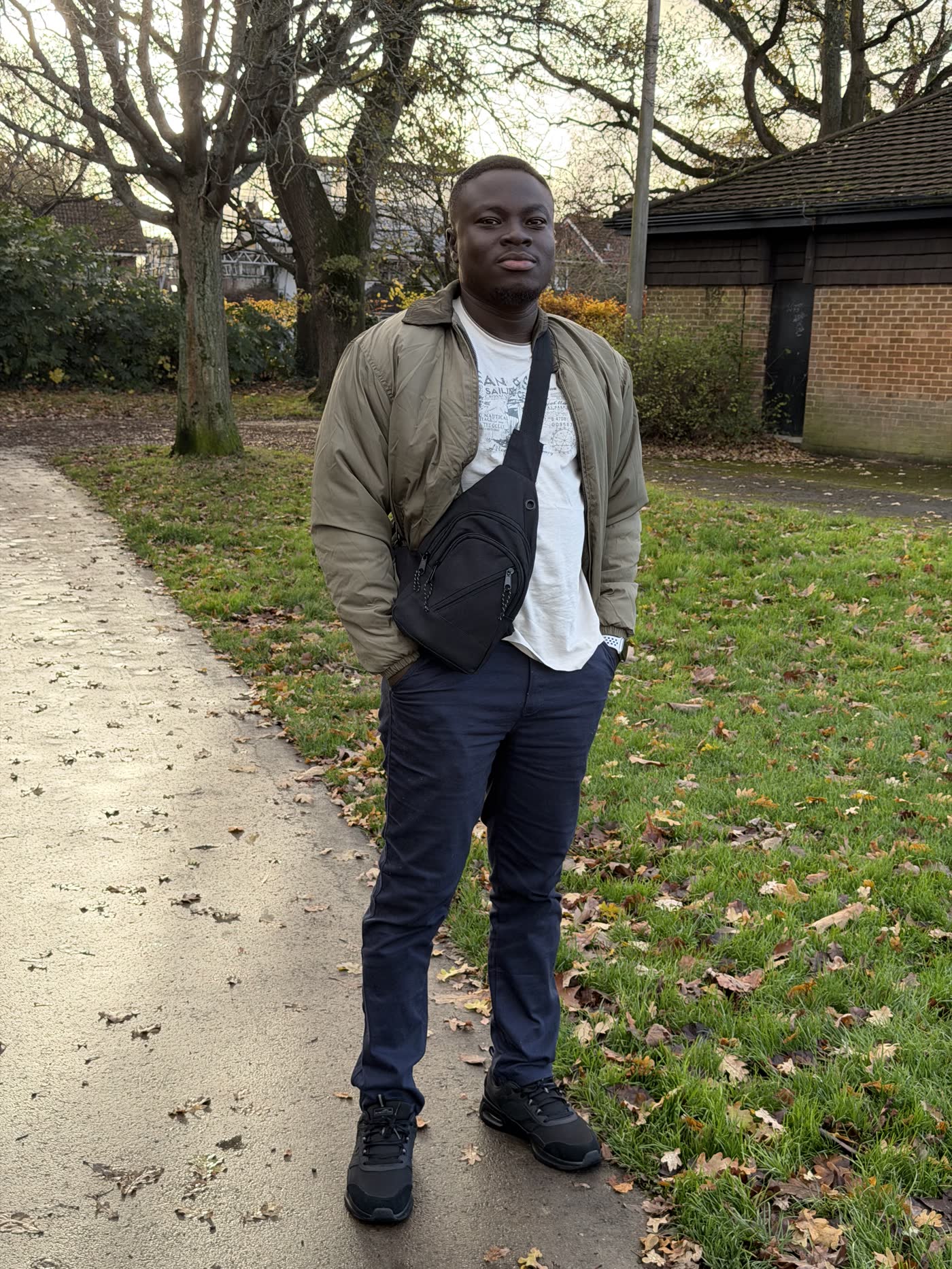 Daniel Lartey standing outdoors